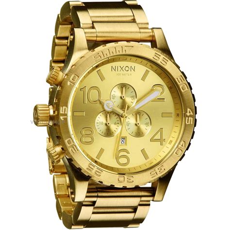 fake gold nixon watch